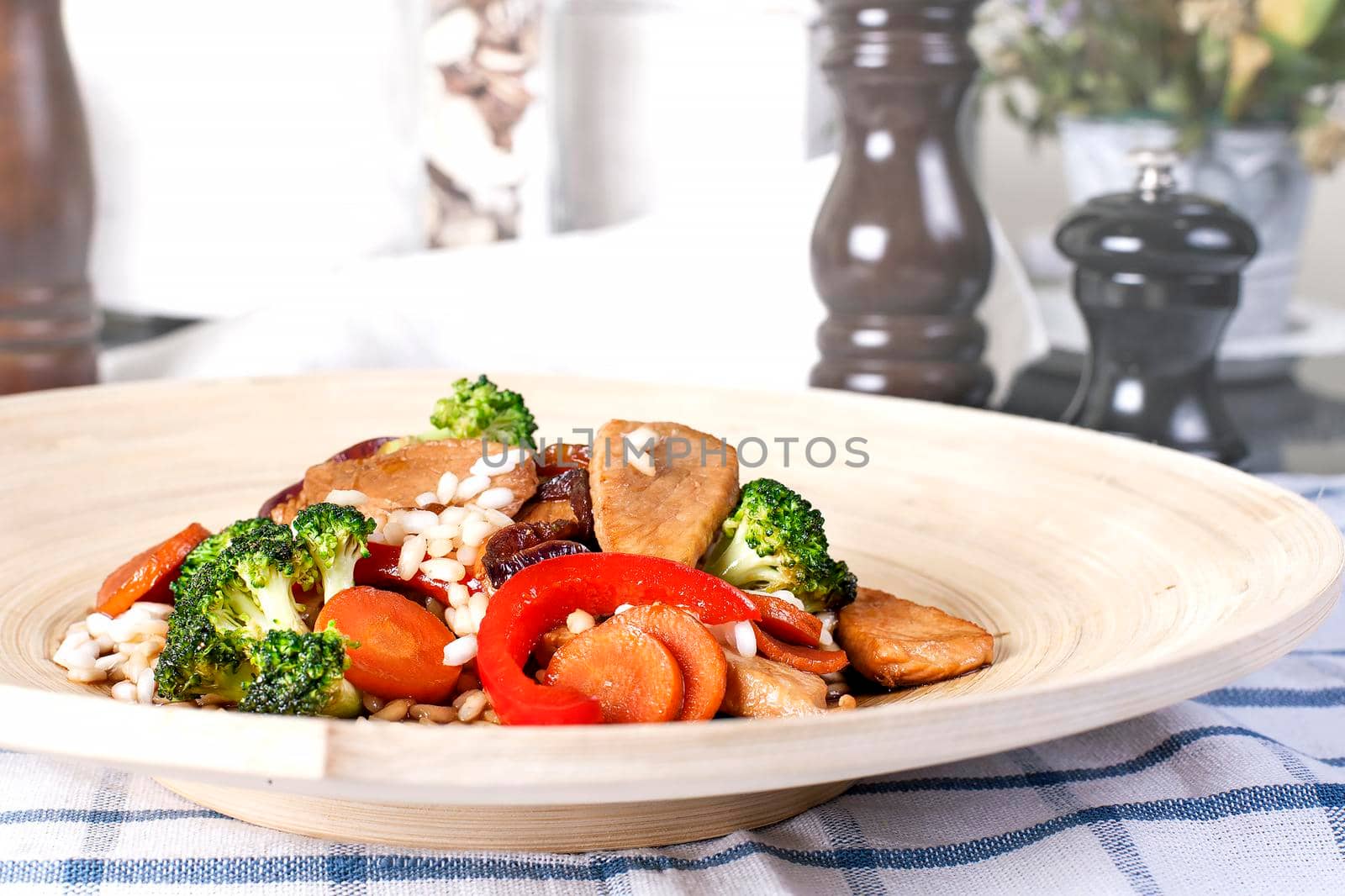 Teriyaki Chicken with Steam Rice and vegetables. Plated meal on restaurant - Stock image.