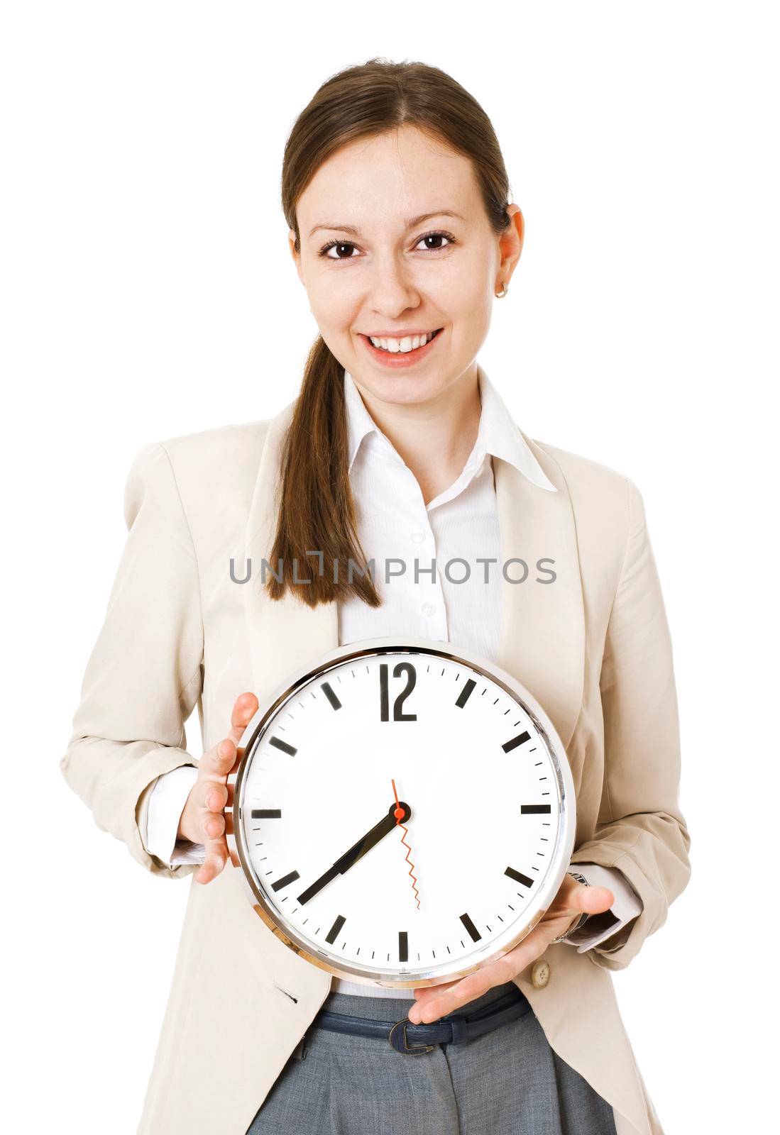 Smiley young businesswoman holding clock. isolated on white background