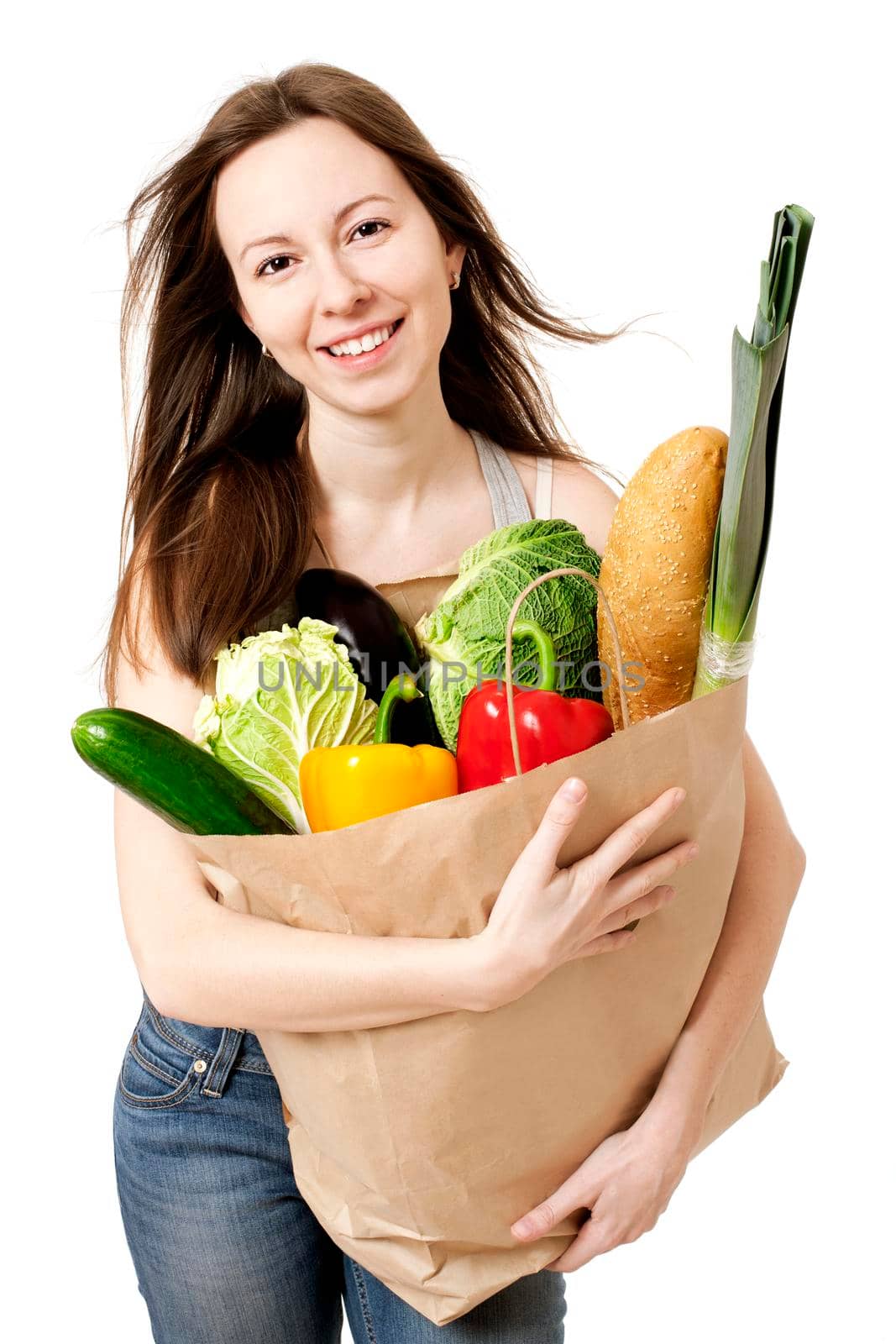 Happy Young Woman Holding Large Bag of Healthly Groceries - Stock Image/ Isolated on white