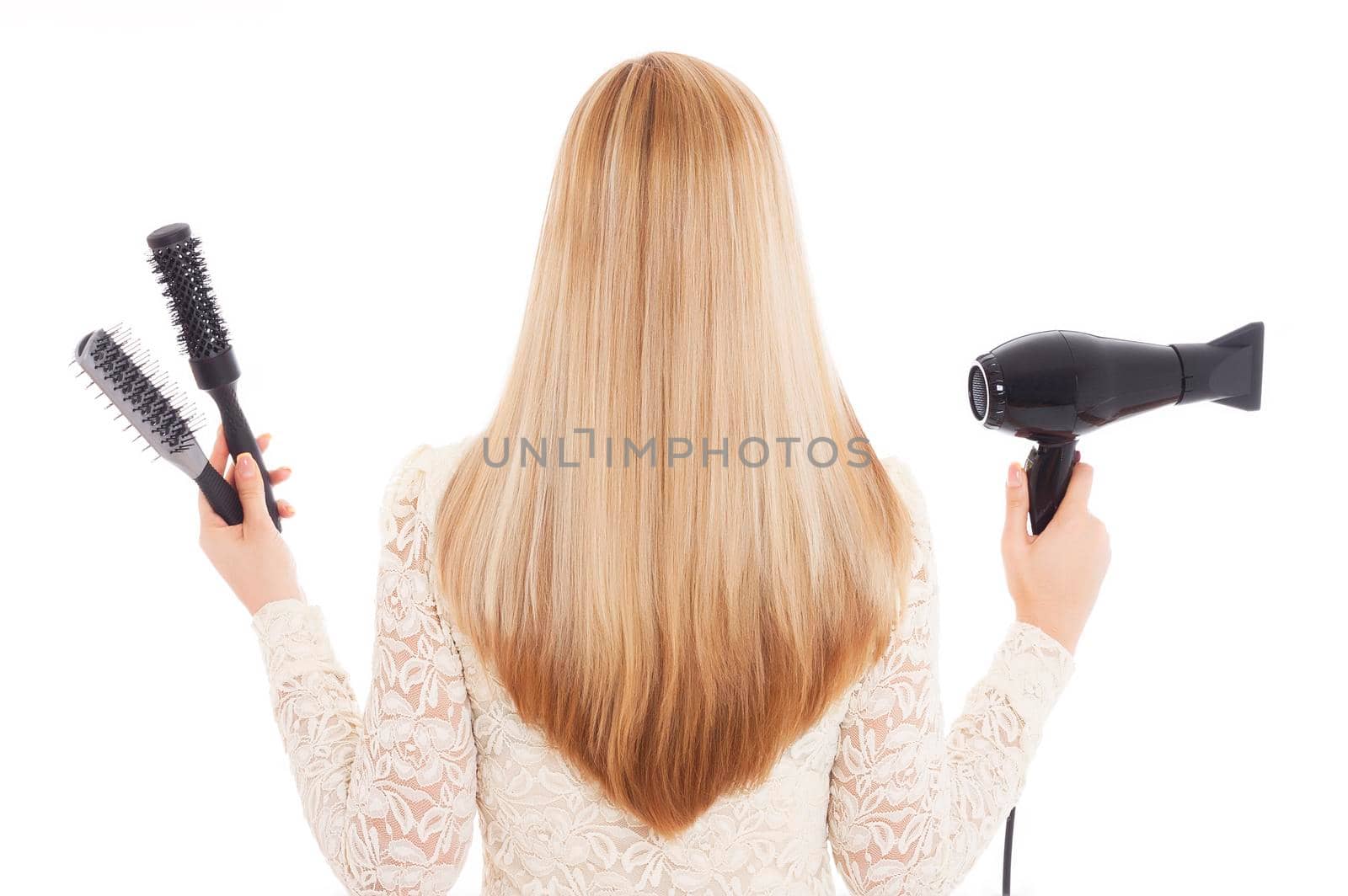 Blonde hair and hairdresser's tools - Stock Image by Jyliana