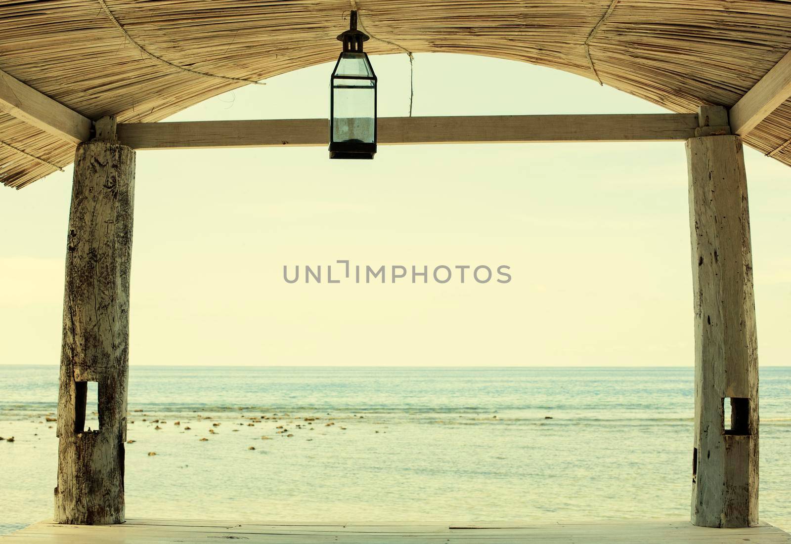 Wooden terrace on the beach. Old-fashioned. by Jyliana