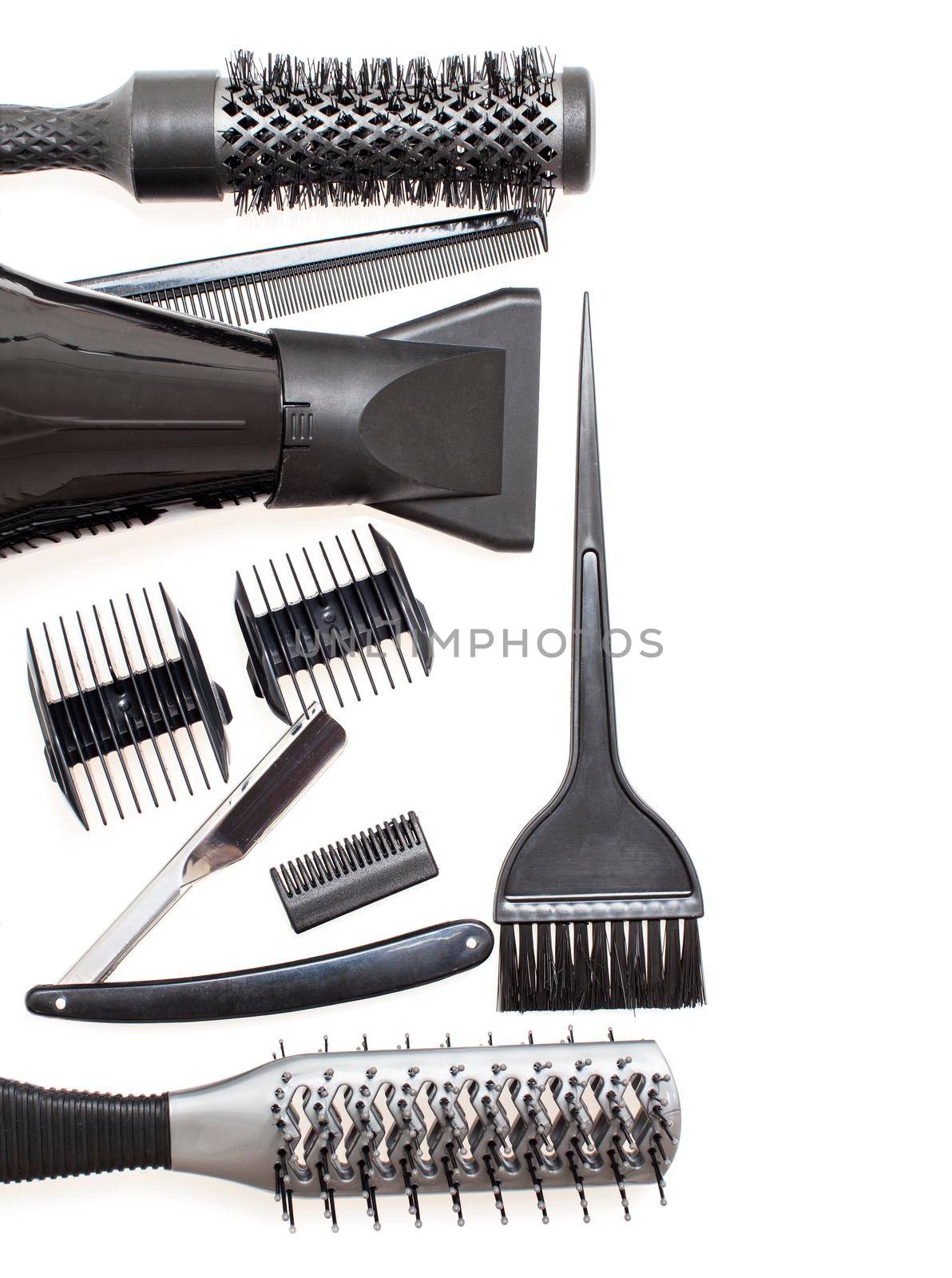 Hairdresser Accessories, Comb, Scissors and Razor for cutting hair on a white background