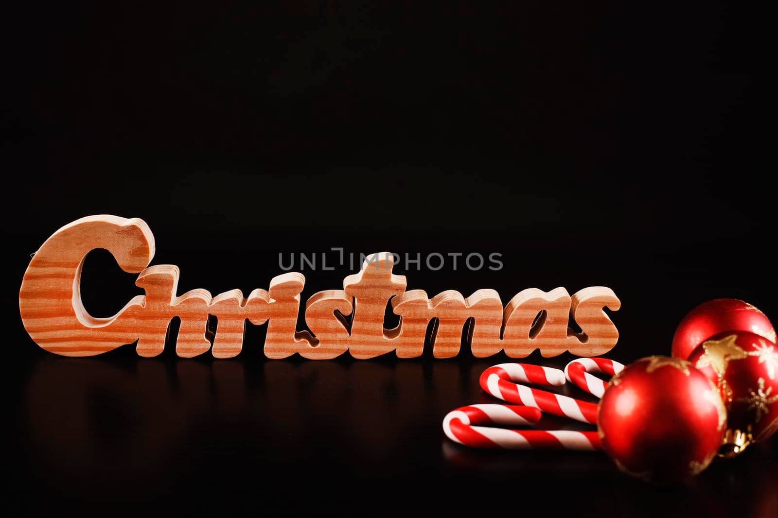 Christmas ball. Decoration candy and bauble isolated on black background