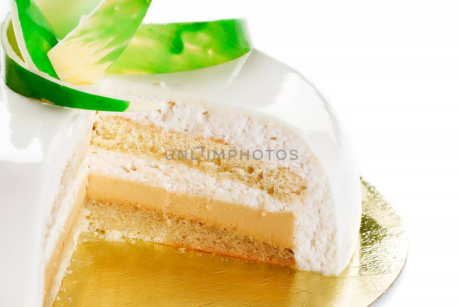 Cake in white glaze. Pastry. Jellies and souffle. Isolated on white - Stock image