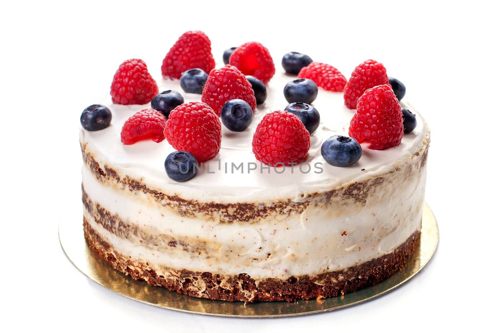 chocolate cake with raspberries and blueberries. by Jyliana