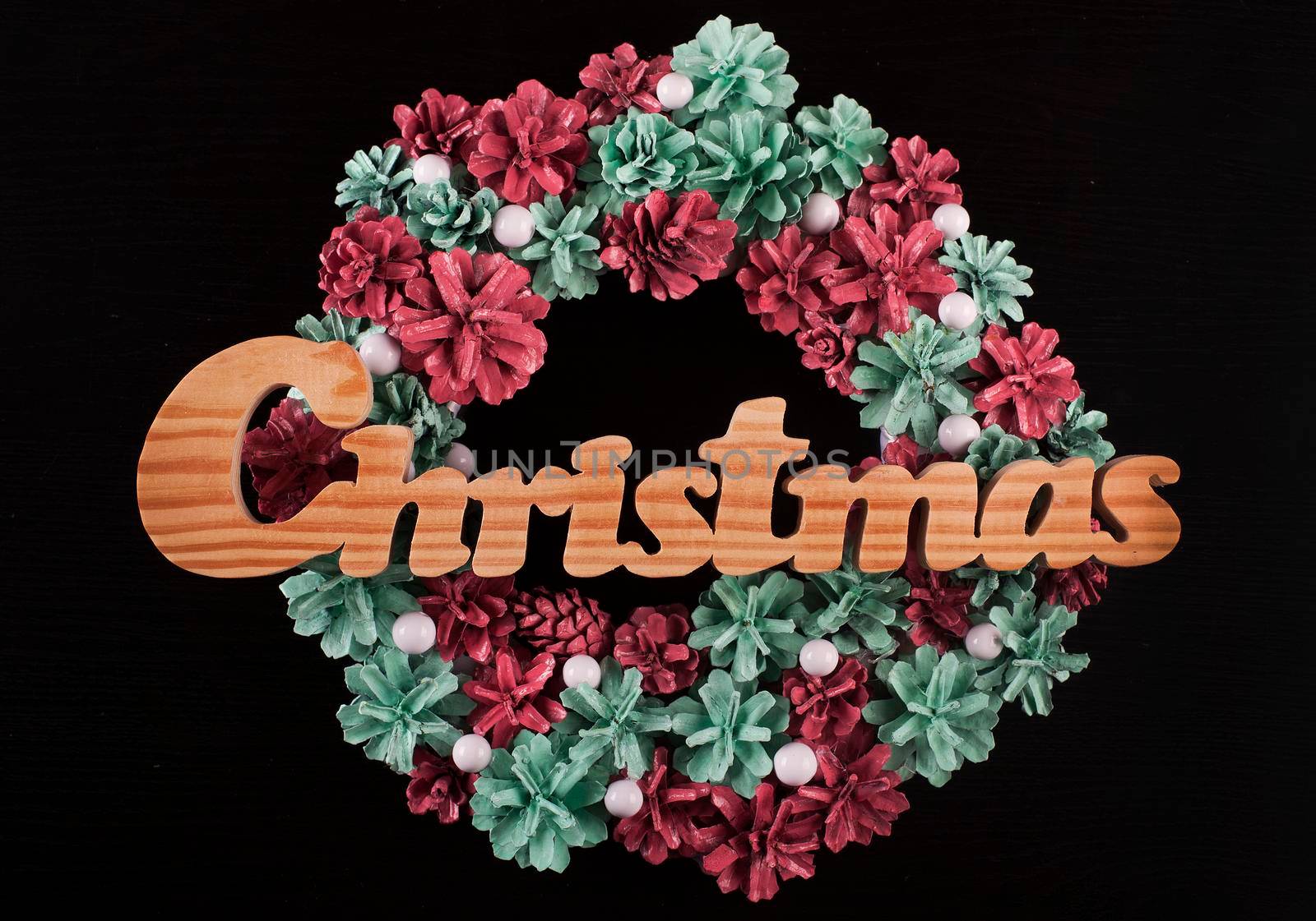 Christmas frame for greeting card with decorative wreath. black background