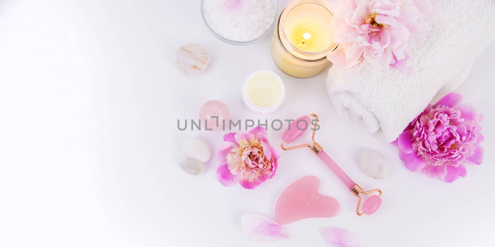 Pink flowers on white background spa facial. Selective focus. Nature.