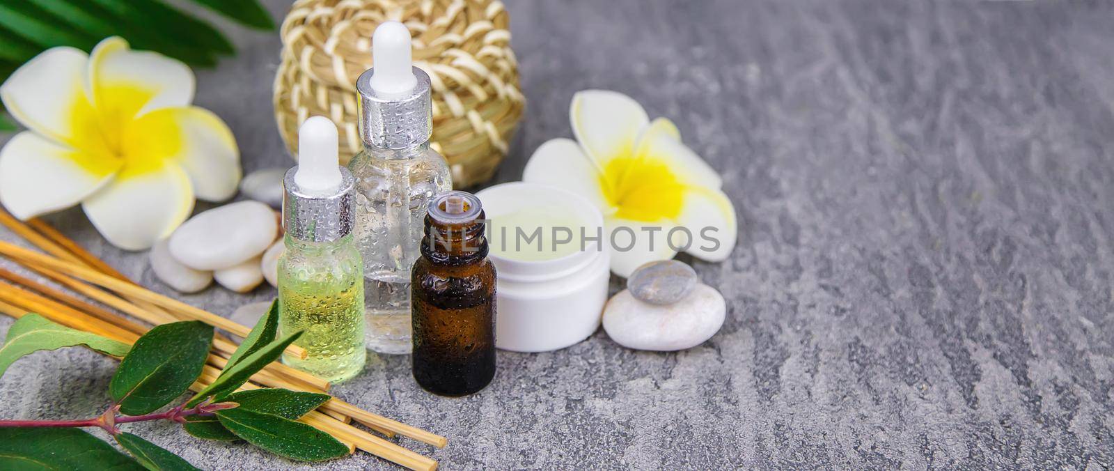 Background spa cosmetics and oils and herbs. Selective focus. Nature.