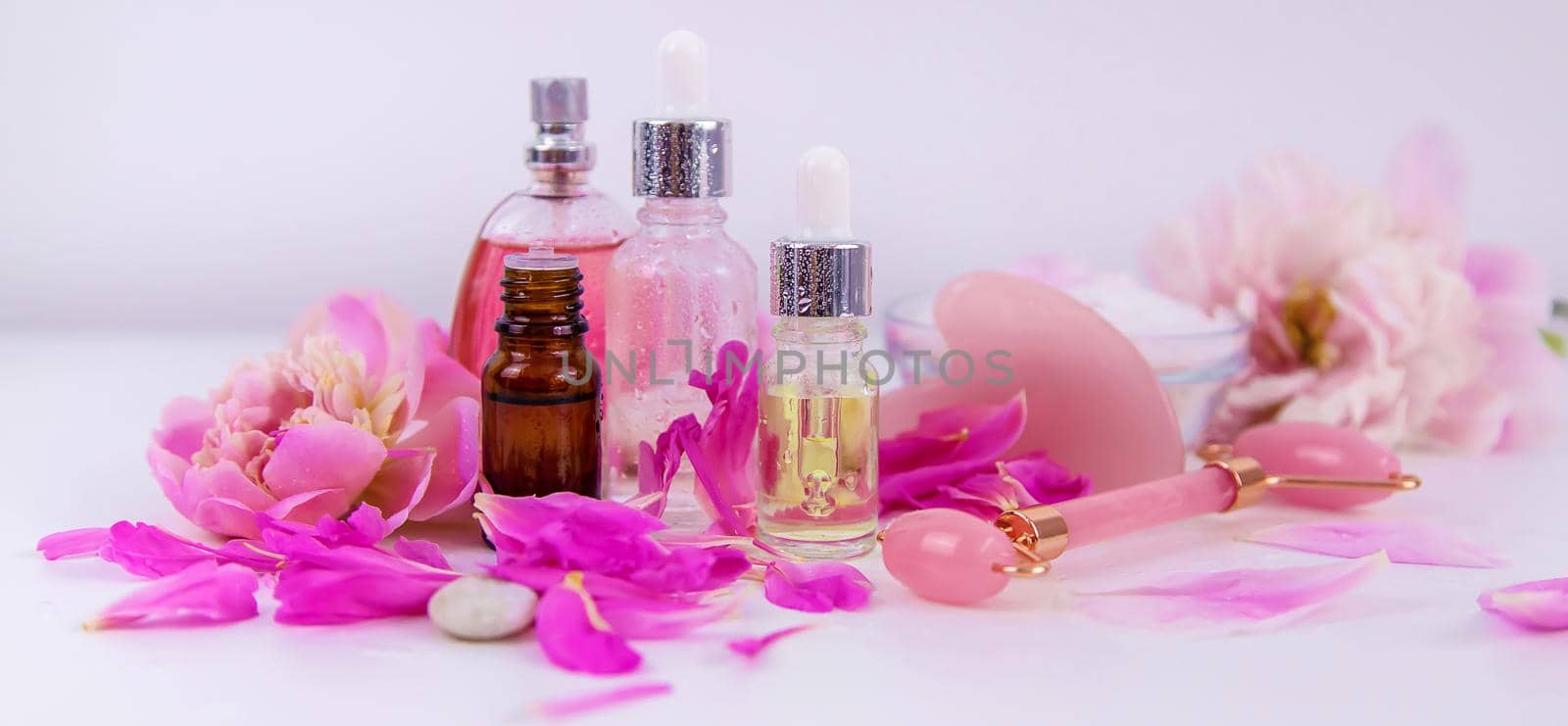 Pink flowers on white background spa facial. Selective focus. Nature.
