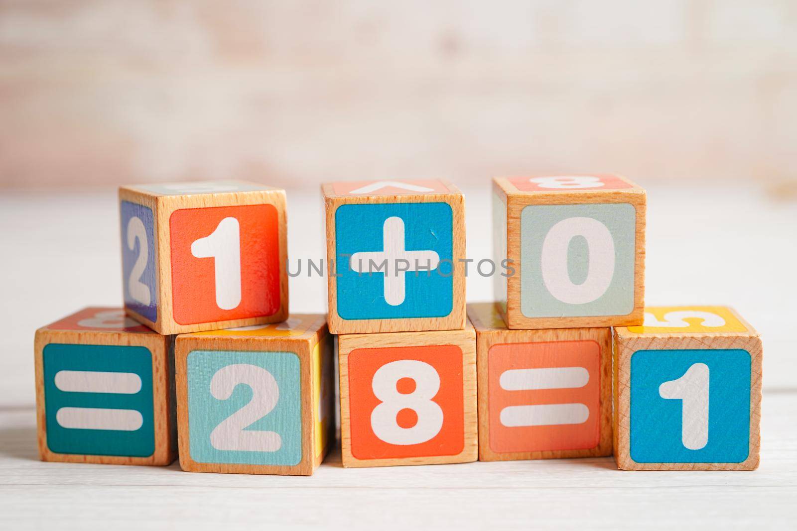 Number wood block cubes for learning Mathematic, education math concept.