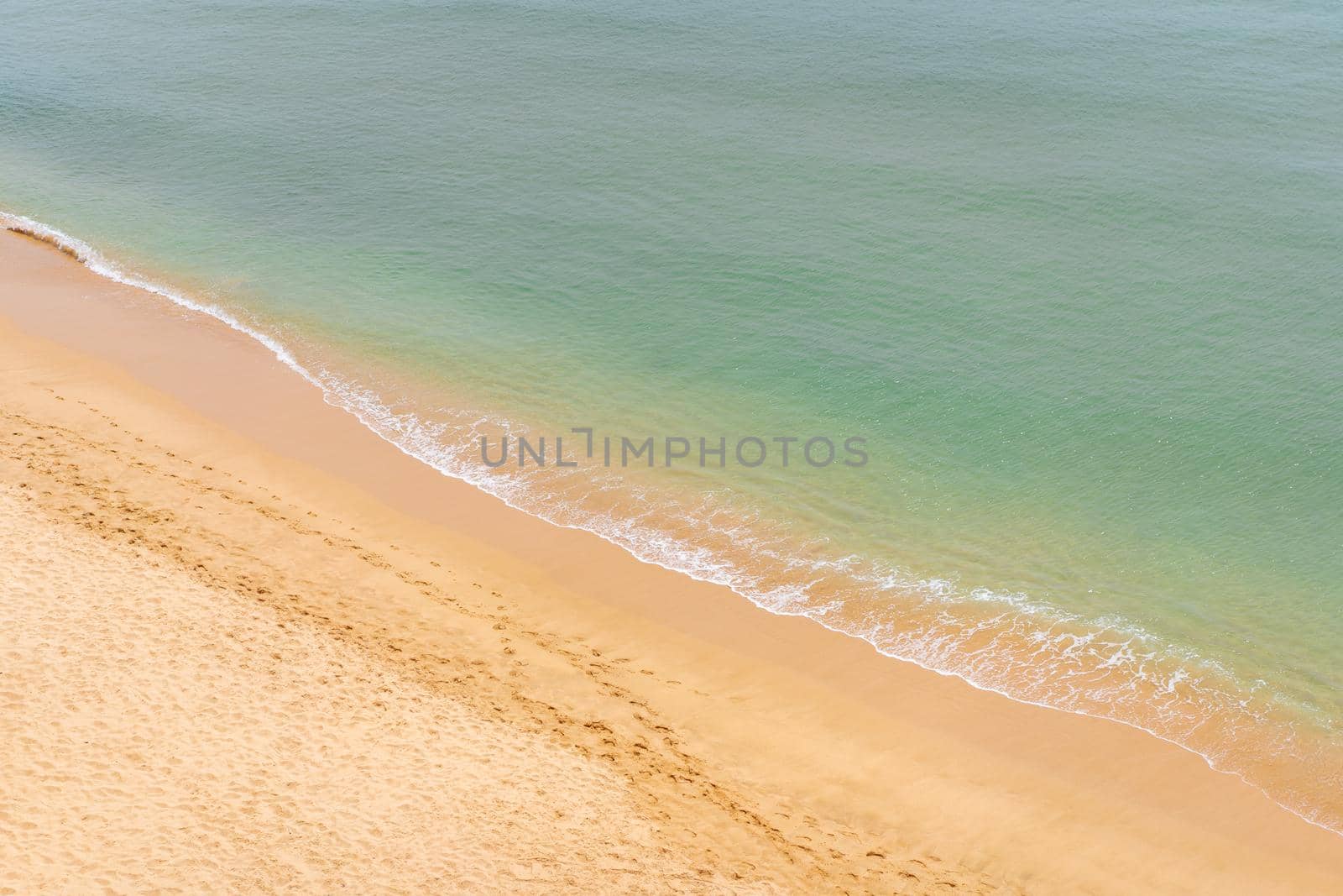 Aerial view of sea waves and sandy beach Atlantic ocean seashore