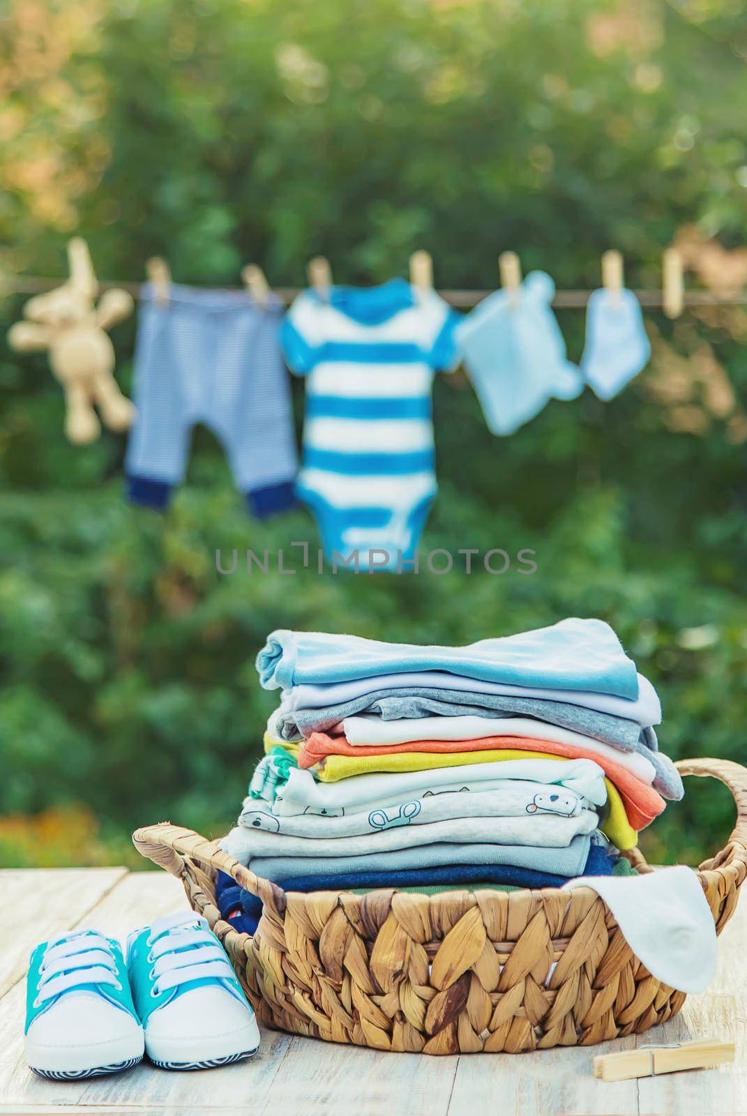 washing baby clothes. Linen dries in the fresh air. Selective focus. by yanadjana