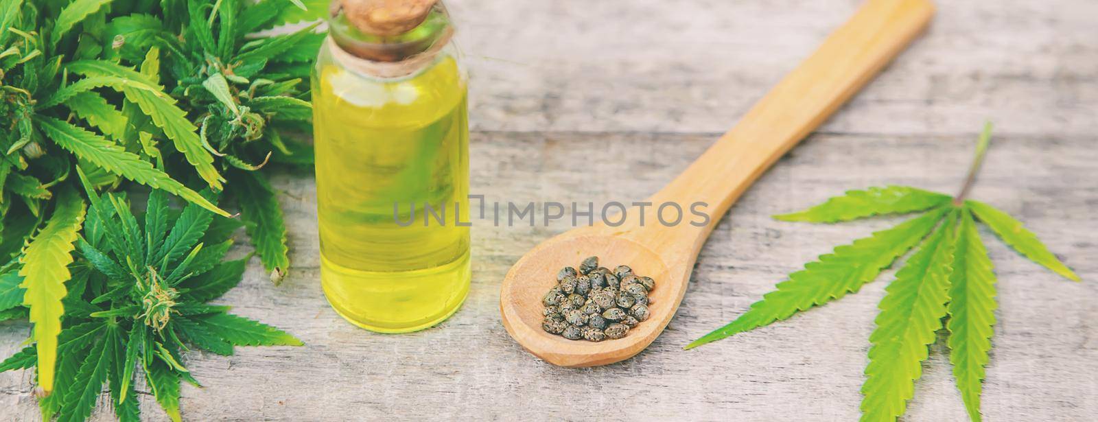Cannabis oil in a small bottle. Selective focus. nature.