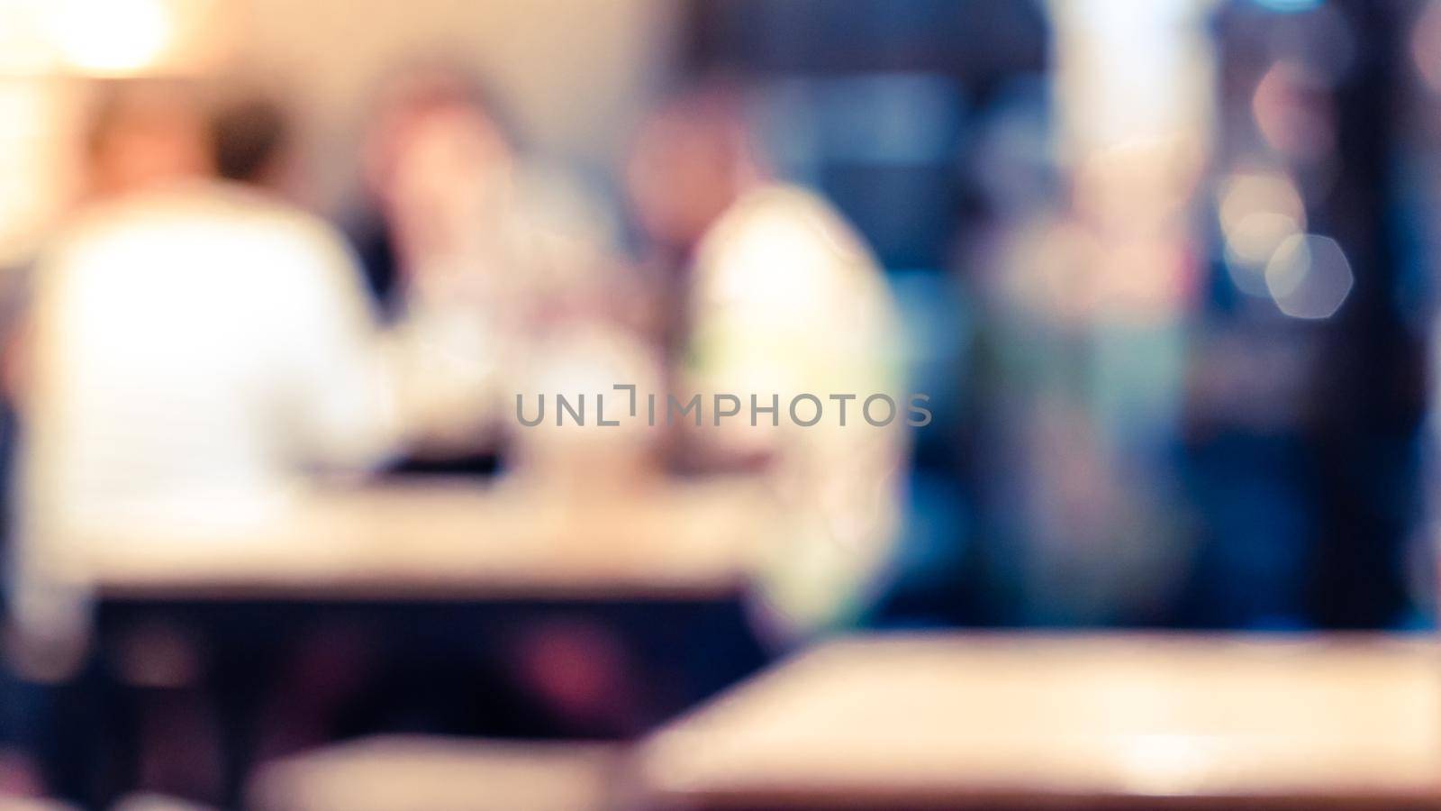 Blur photography for background in restaurant of group of friend. Meeting. Party idea