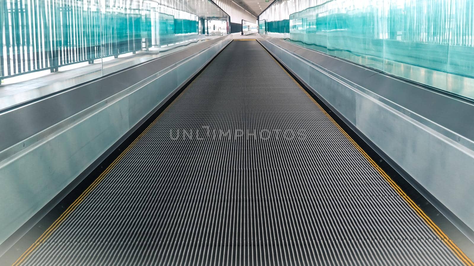 Modern walkway of escalator move forward and escalator move backward in international airport. Escalator is facility for support transportation