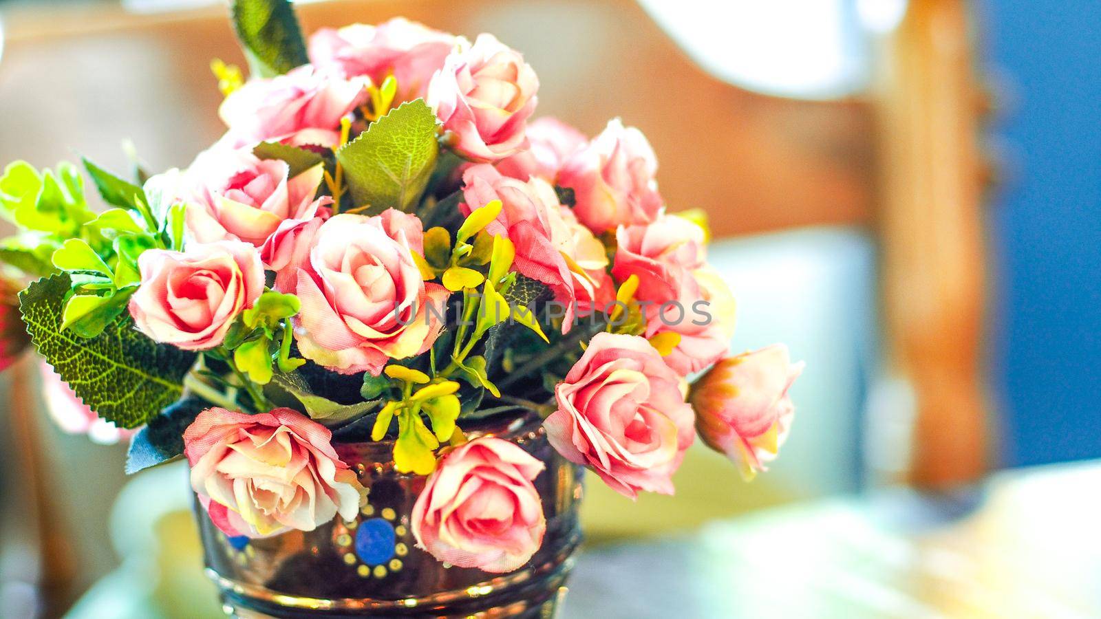 Bouquet vintage group of pink roses on wooden table, soft focus by Petrichor