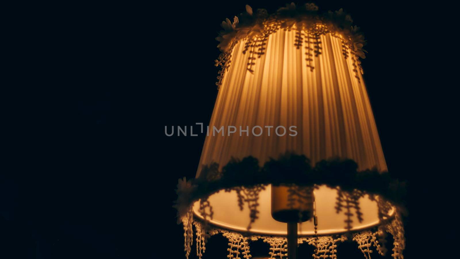 Vintage table lamp illuminated, Elegant Chandelier illuminated interior decoration in five star hotel or luxury house