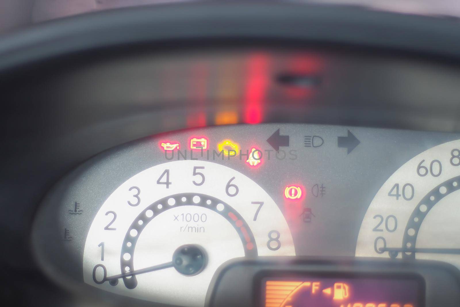 Close-up on speedometer in dashboard car. Speed gauge meter. Travel abstract concept idea background.