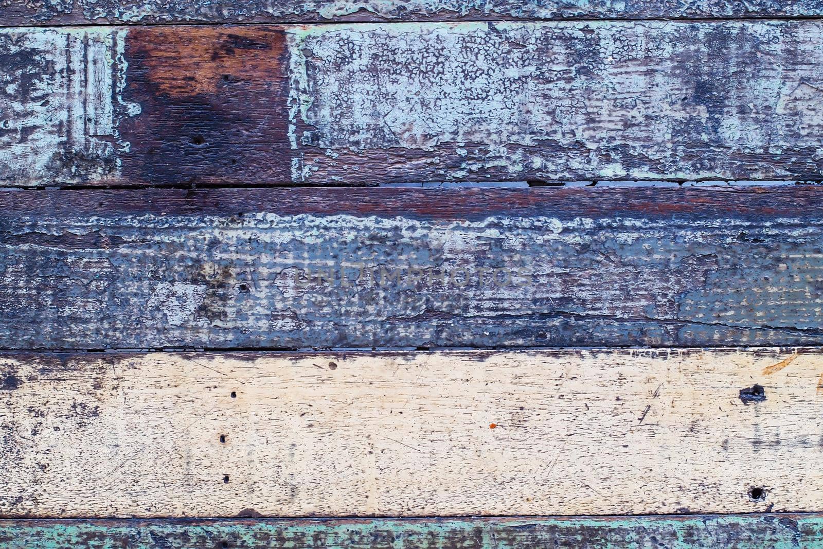 Vintage wood background with peeling paint. Vintage beach wood background - Old weathered wooden plank painted