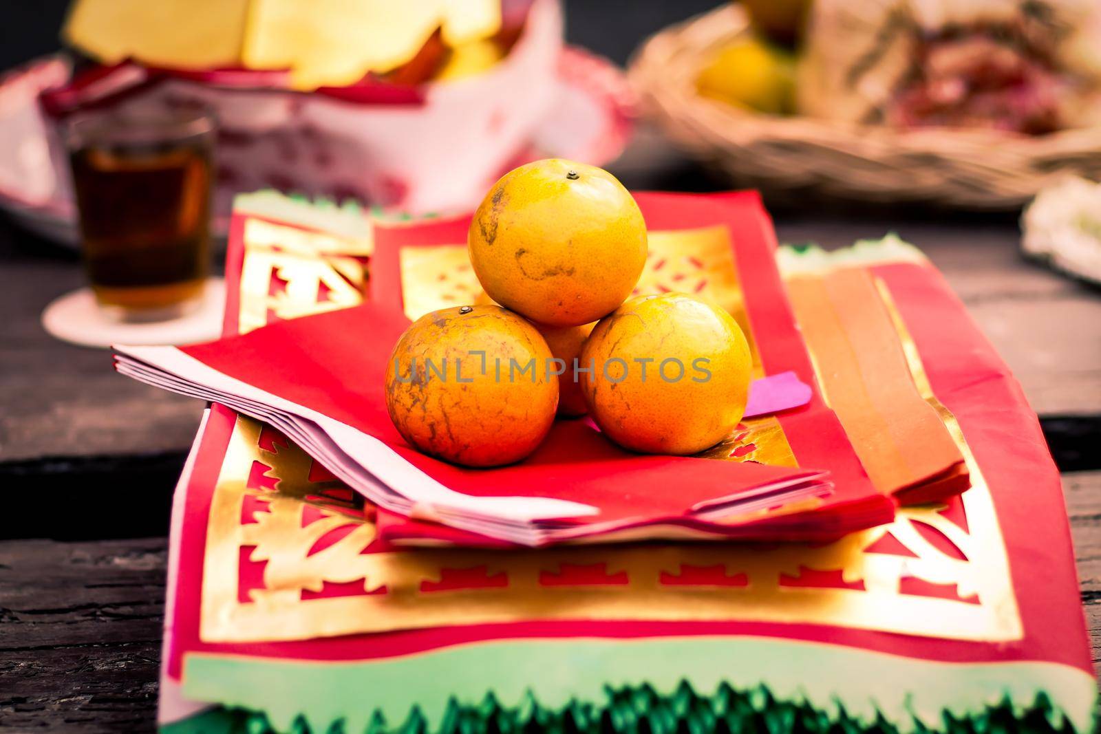 Orange fruit on traditional Chinese paper for praying on Chinese New year