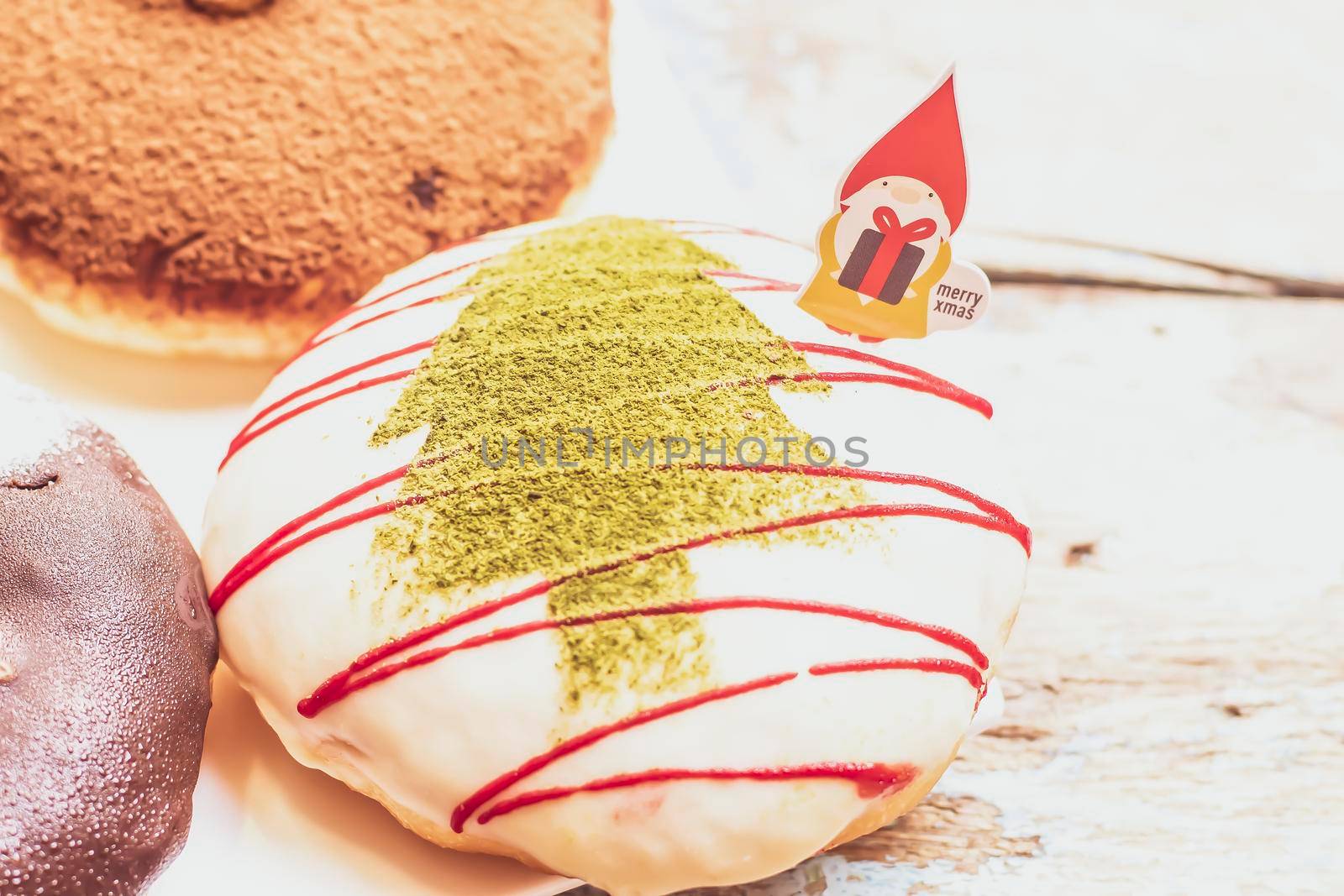 Christmas homemade desserts on table in decorated New Year background