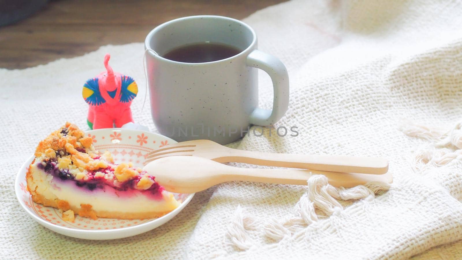 blueberry cheese cake on plate and a cup of coffee morning breakfast by Petrichor