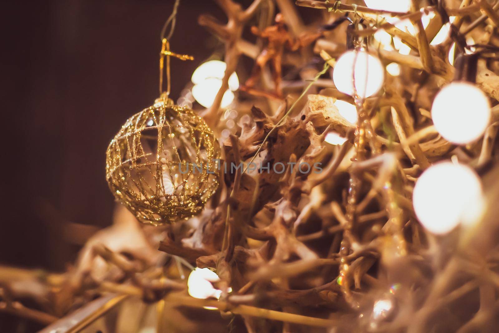 Light bulb decor in party . abstract christmas tree in golden ligh by Petrichor