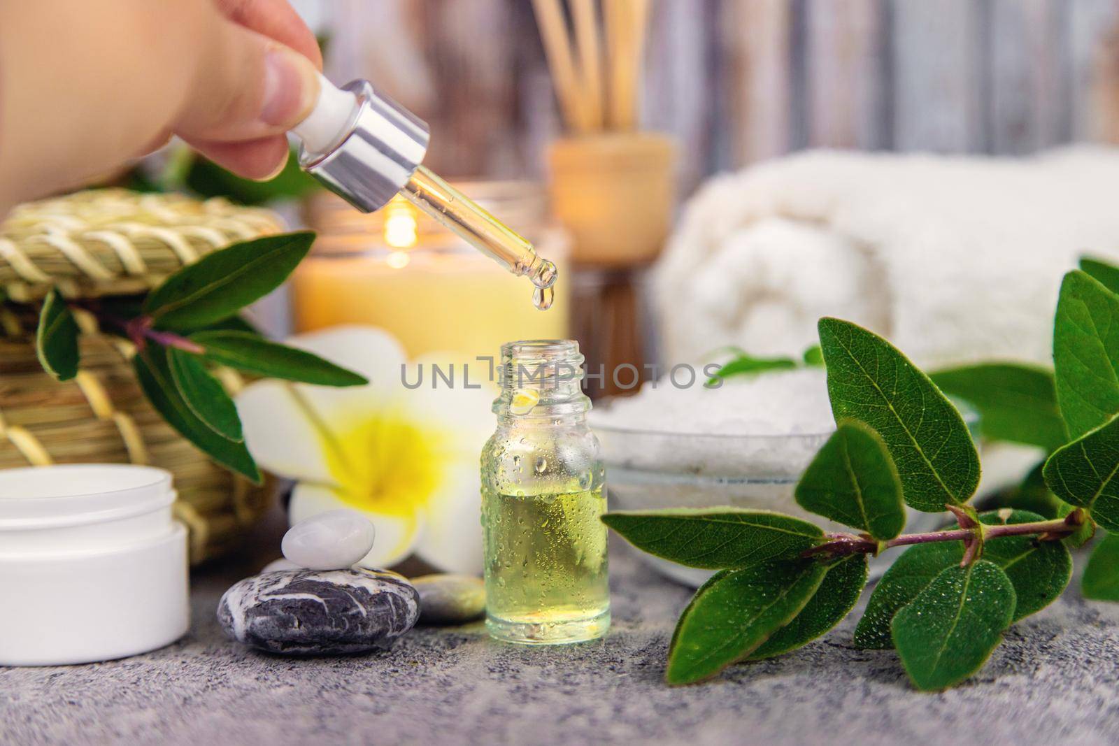 Background spa cosmetics and oils and herbs. Selective focus. Nature.