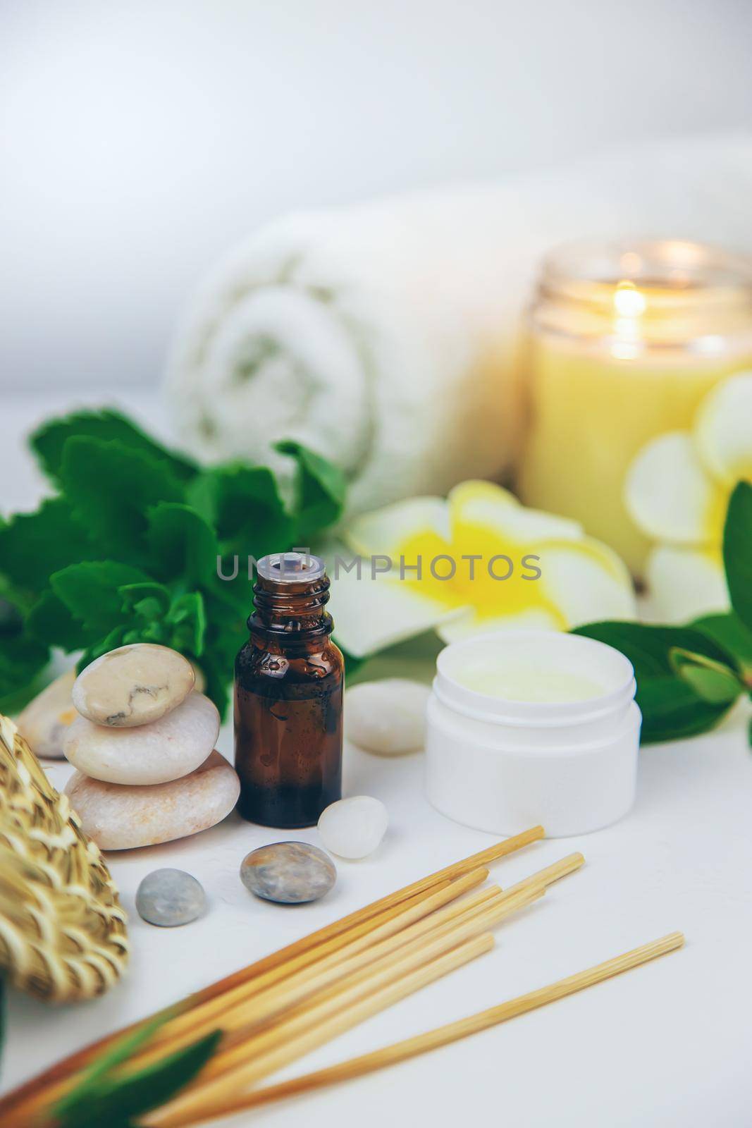 Background spa cosmetics and oils and herbs. Selective focus. Nature.