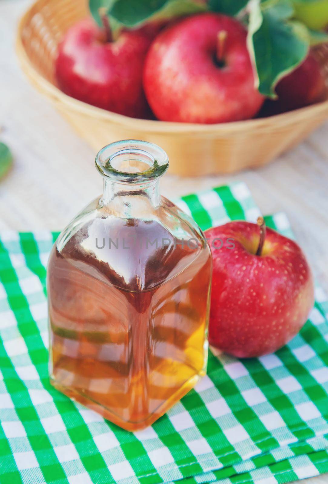 Apple cider vinegar in a bottle. Selective focus. nature.