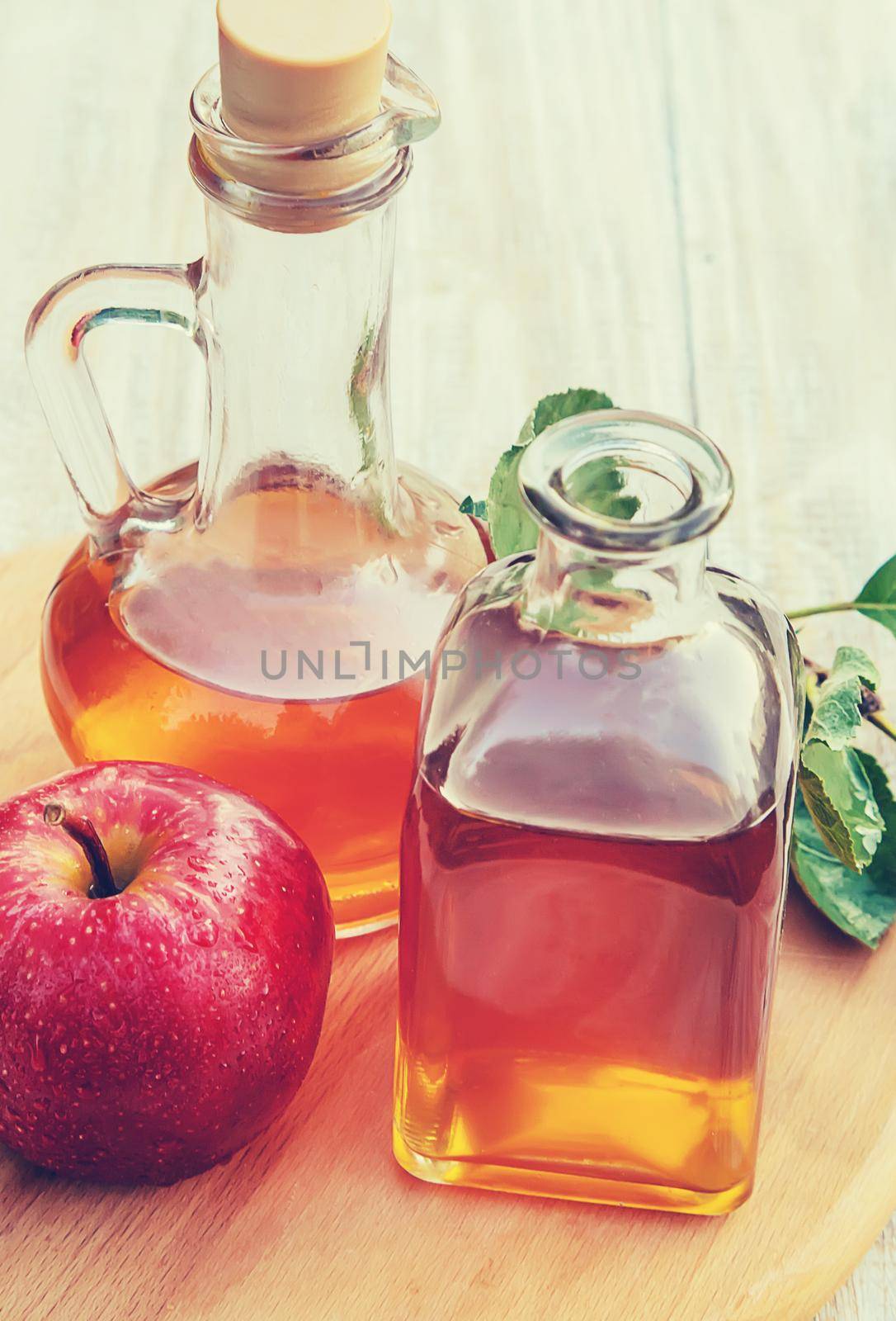 Apple cider vinegar in a bottle. Selective focus. nature.