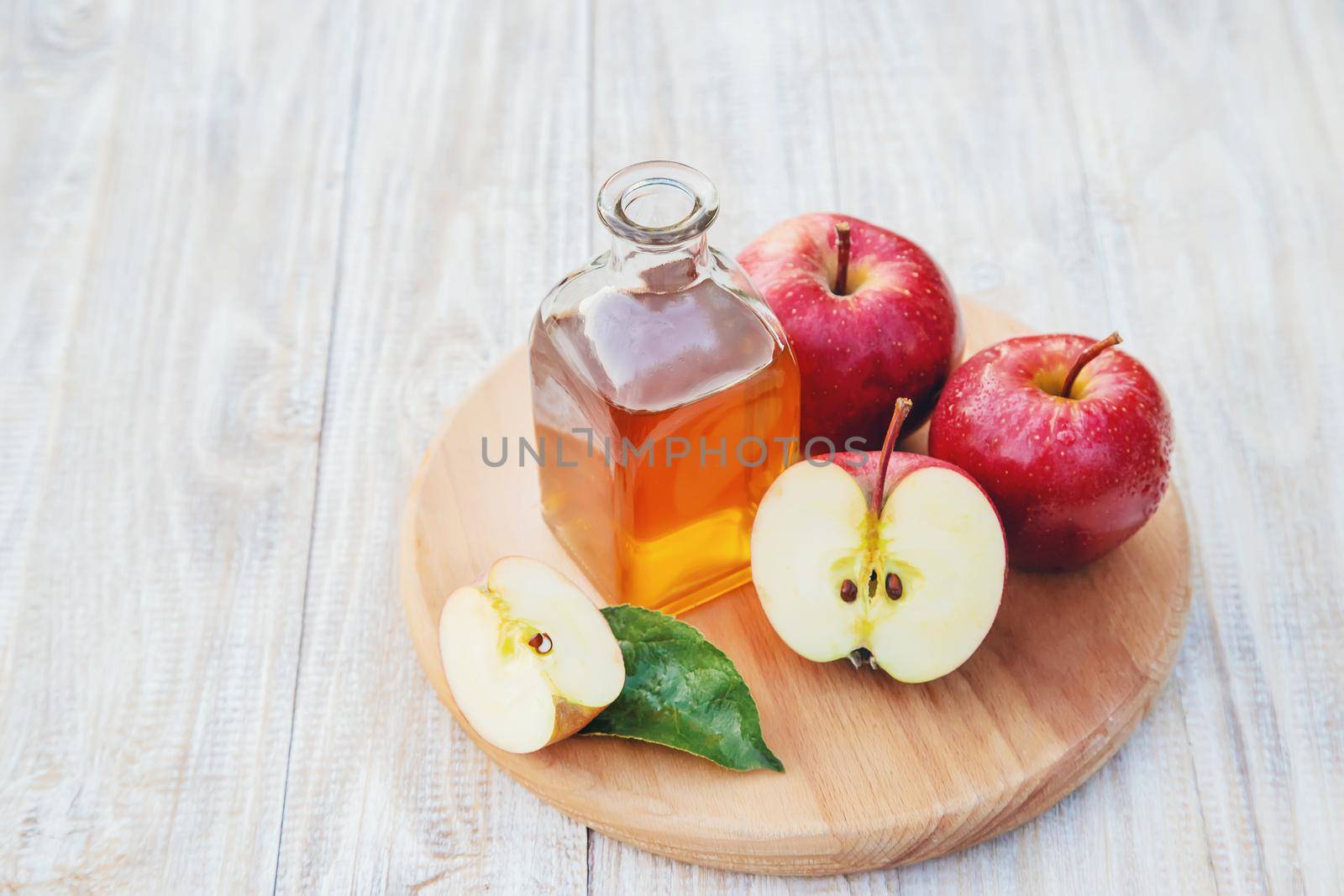 Apple cider vinegar in a bottle. Selective focus. nature.