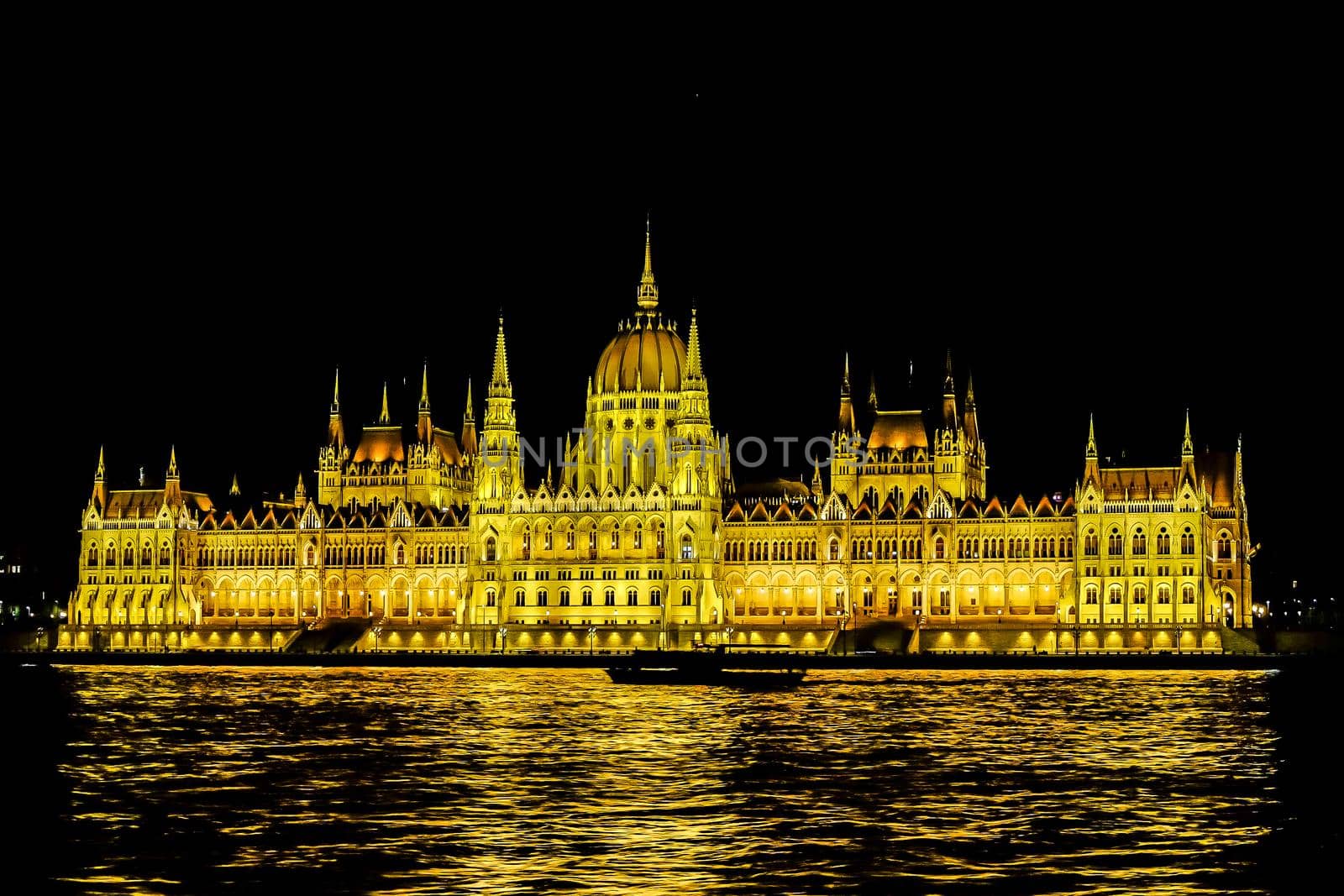 Budapest Parliament at night. gold light installation .Beautiful destination tourist spot of Danube by Petrichor