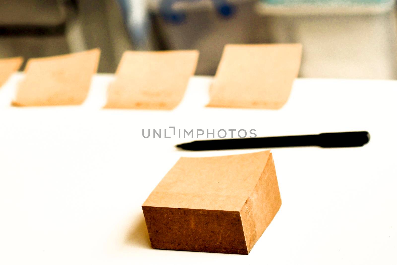 Mockup for check list, empty note paper with pen on brown wood background. Office, writer or study concept working idea by Petrichor