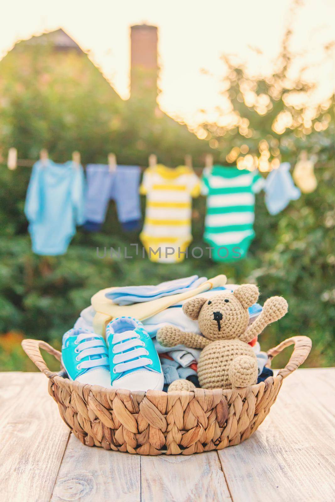 washing baby clothes. Linen dries in the fresh air. Selective focus. by yanadjana