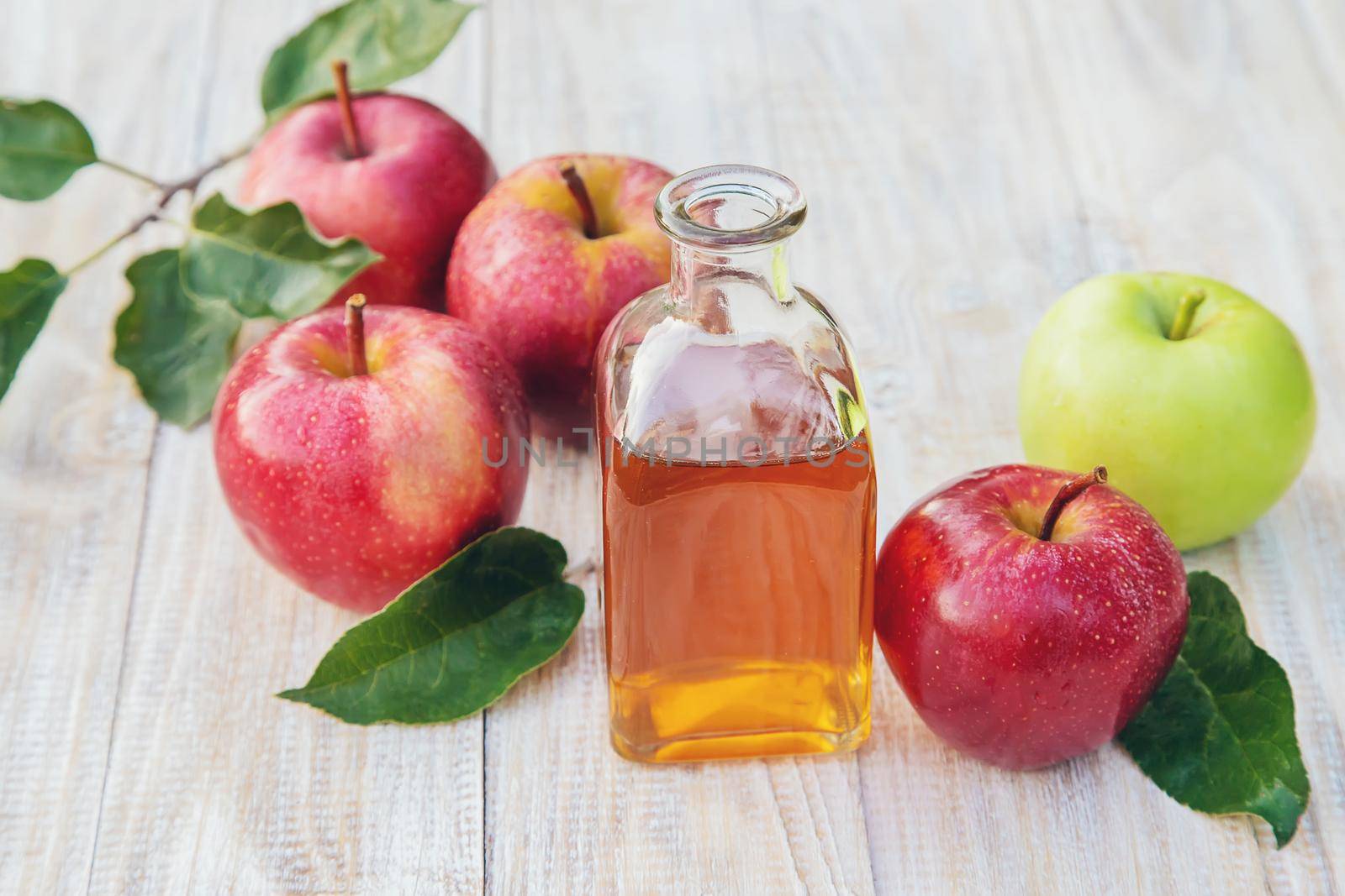 Apple cider vinegar in a bottle. Selective focus. nature.
