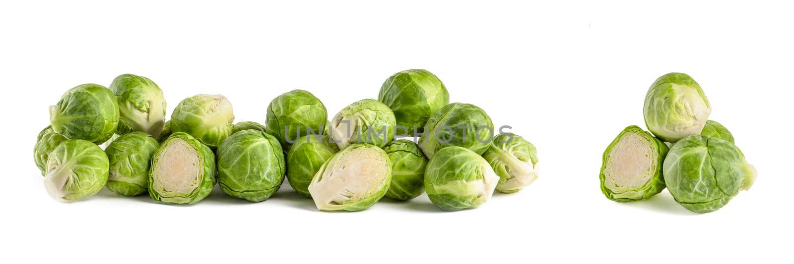 Brussels sprouts. Set of fresh brussels sprouts in stacks on white isolated background. Deep focus stacking