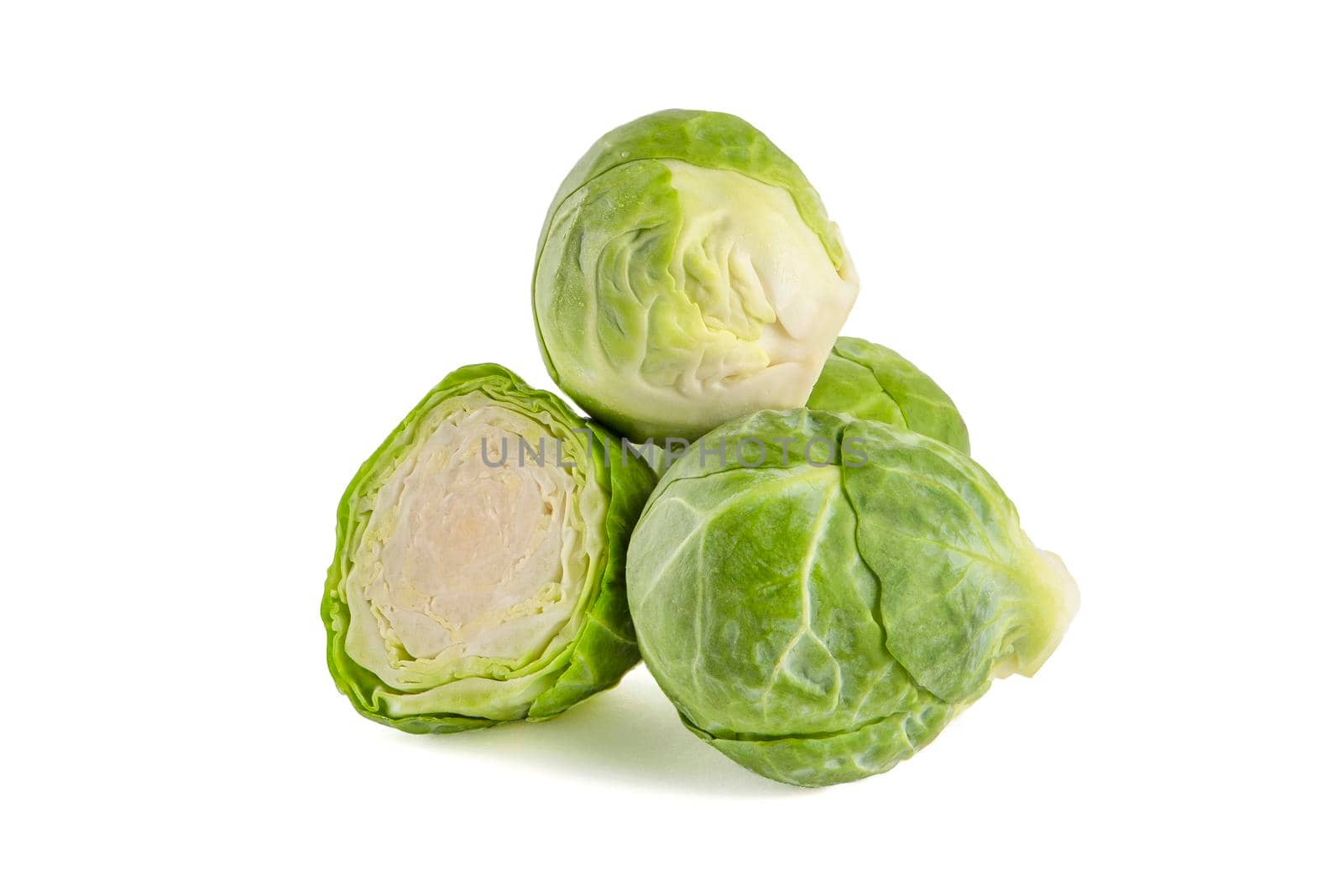 Brussels sprouts, isolate. Fresh, small Brussels sprouts stacked in a stack on a white isolated background
