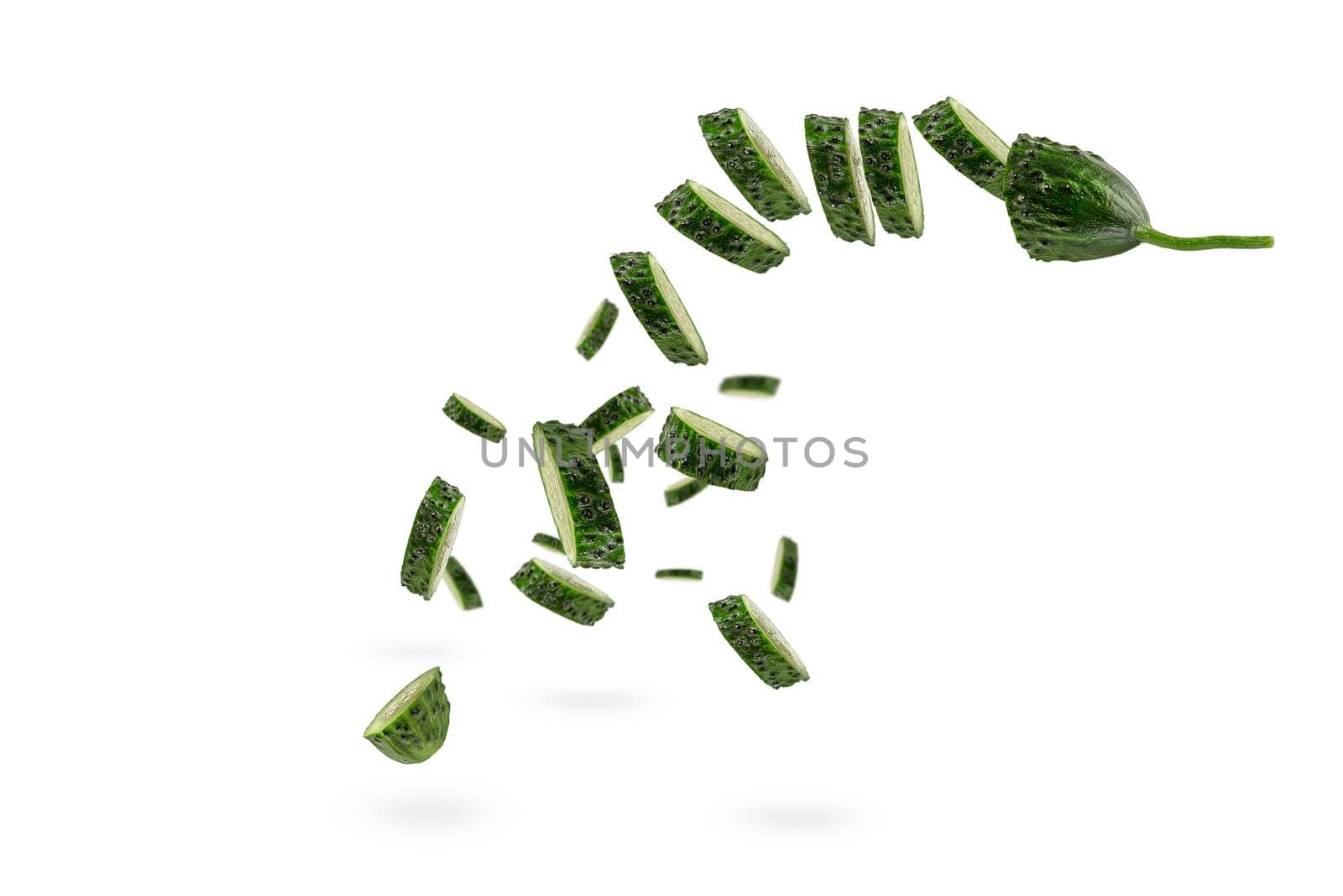 Falling cucumber slices on white isolated background. The cucumber scatters. Cut fresh cucumber into slices hanging in the air