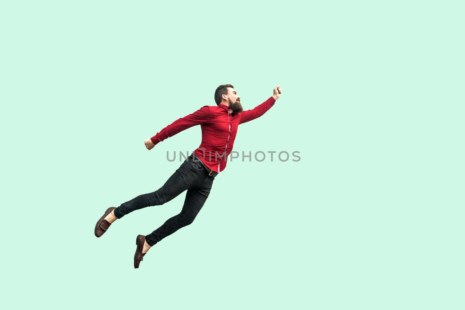 Superman style. Enthusiasm concept. strong bearded businessman felt himself a superhero and flying up. by Khosro1