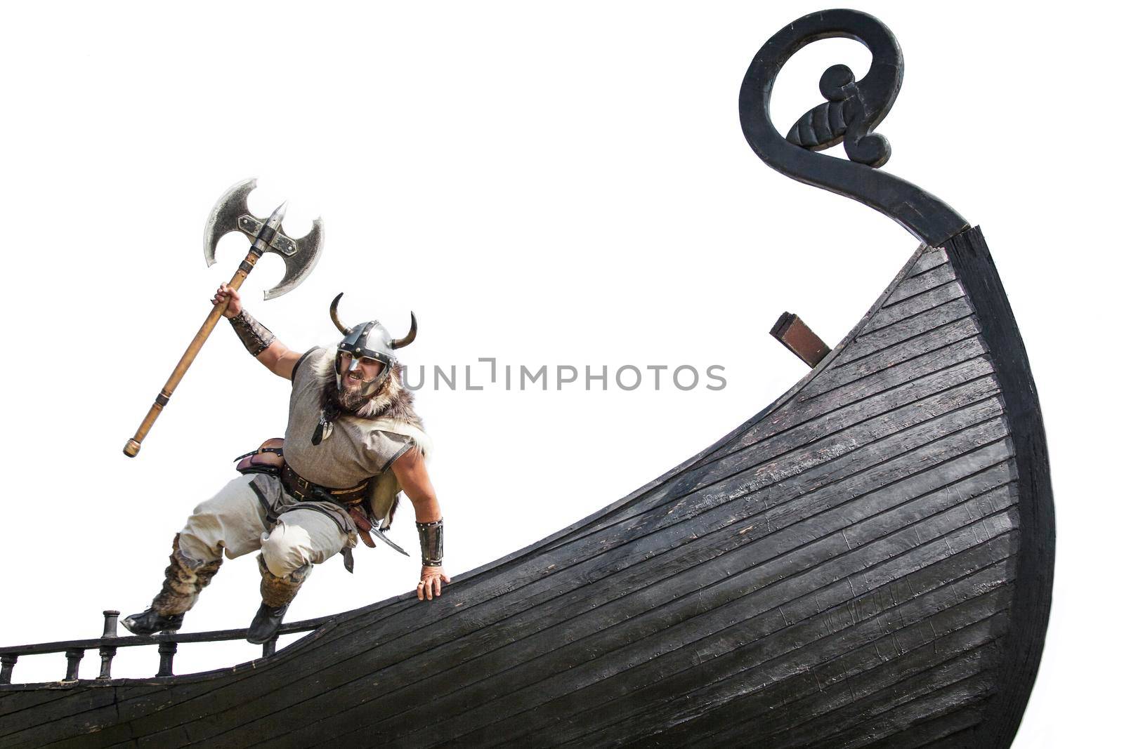 Strong angry bearded Viking with axe jumping from his ship to attack and war. isolated on white background.