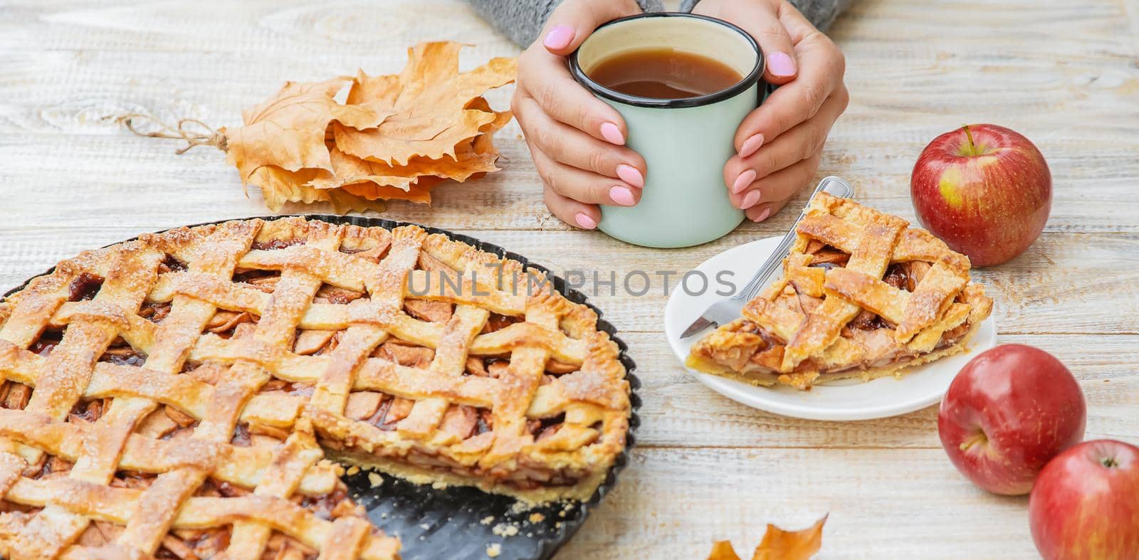 Pie with apples and cinnamon. Selective focus. Food.