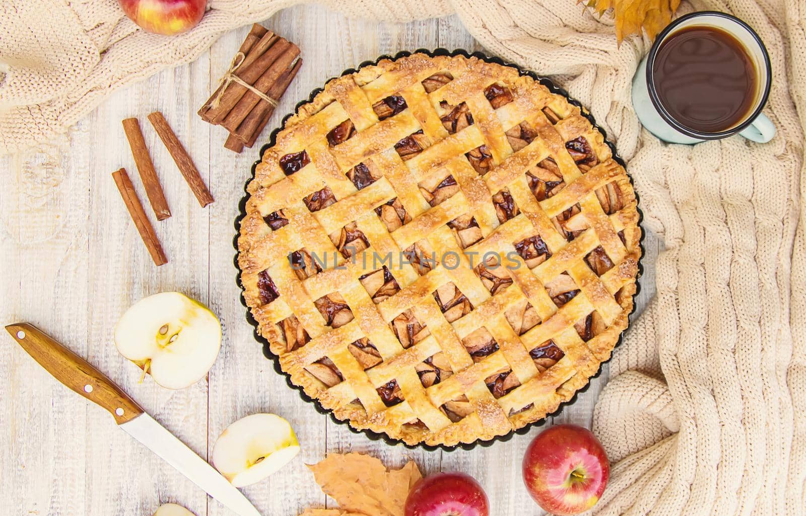 Pie with apples and cinnamon. Selective focus. Food.