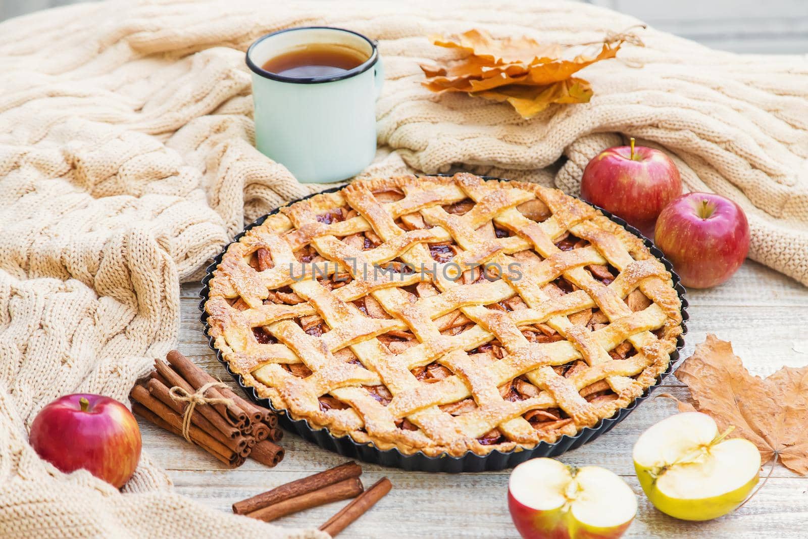 Pie with apples and cinnamon. Selective focus. Food.