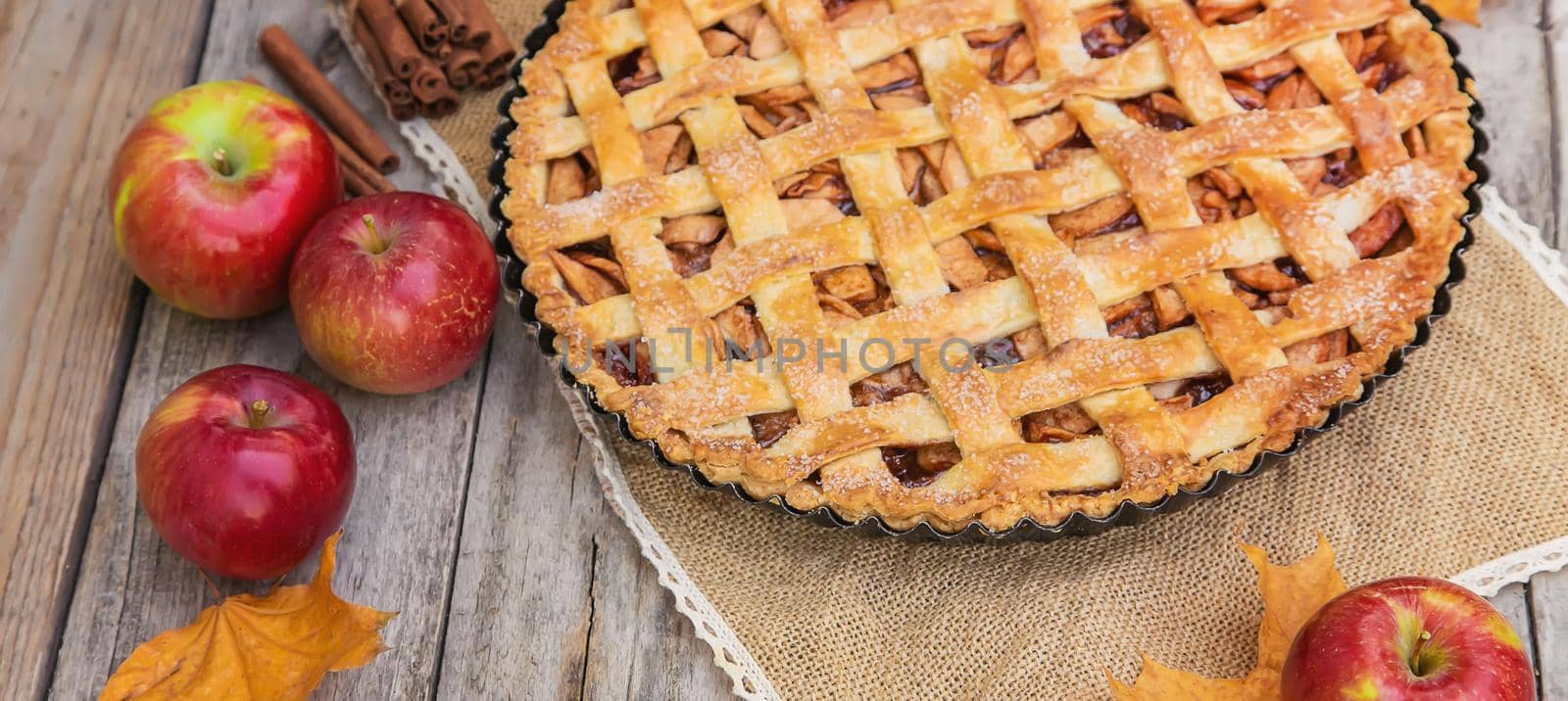 Pie with apples and cinnamon. Selective focus. Food.