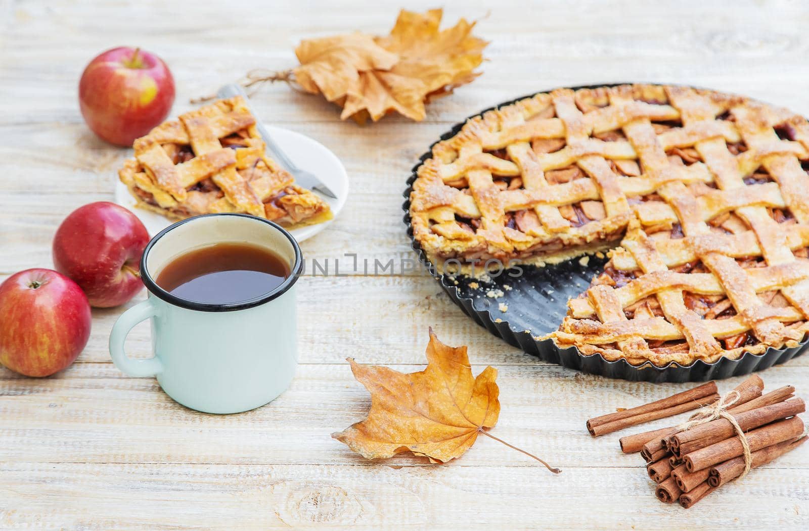 Pie with apples and cinnamon. Selective focus. Food.