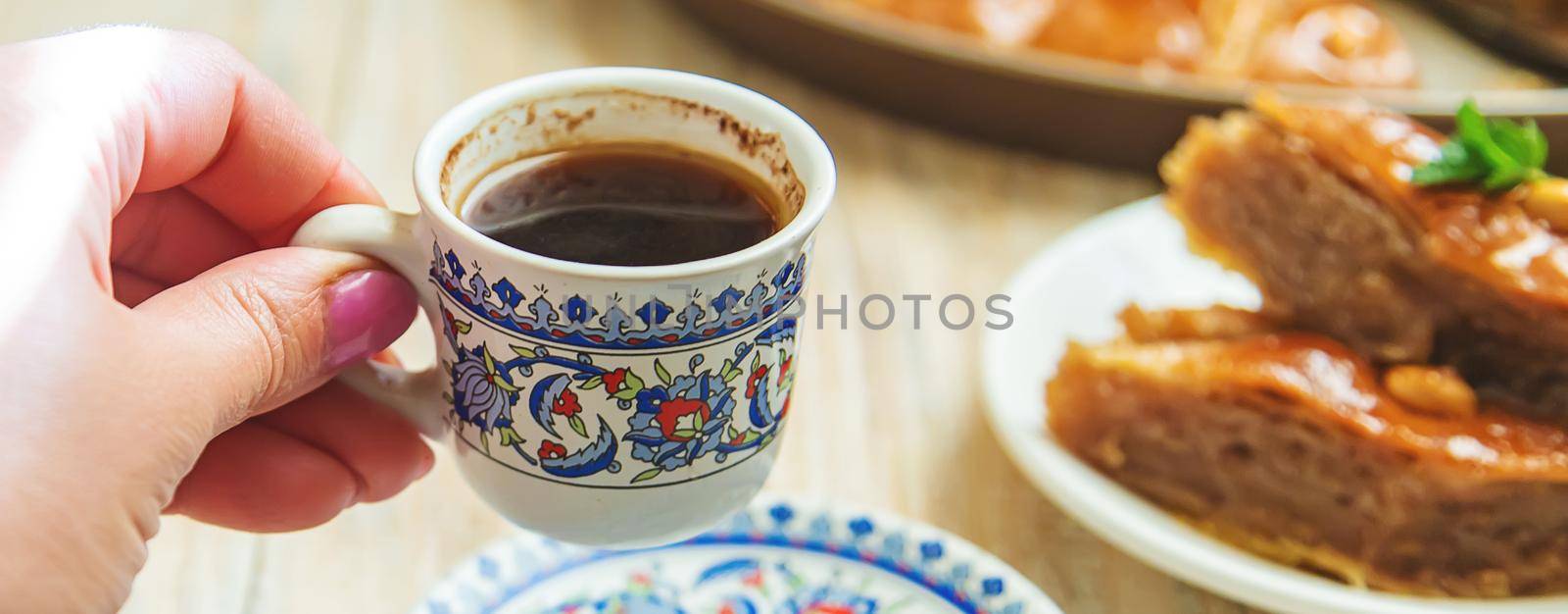 Turkish coffee and baklava on the table. Selective focus. nature.