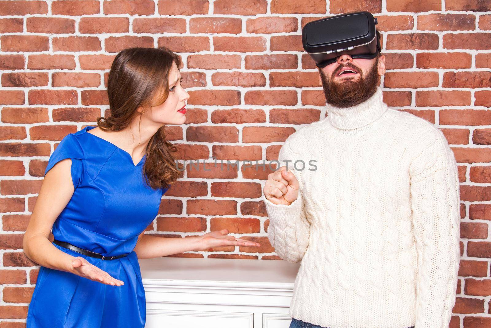 man using vr headset and his wife is angry. by Khosro1