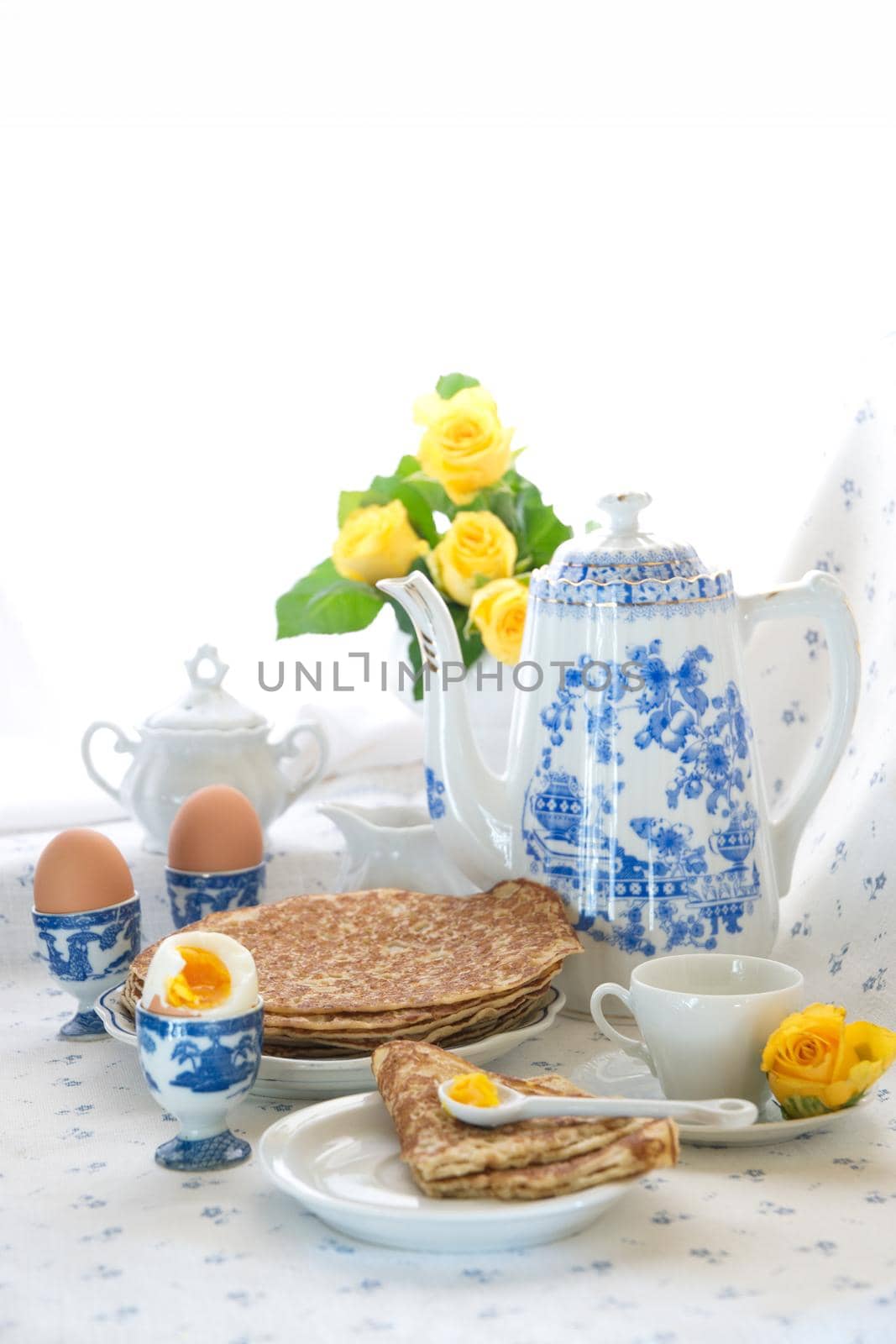 breakfast with pancakes and apple jam for pancake week, spring still life on the window. High quality photo