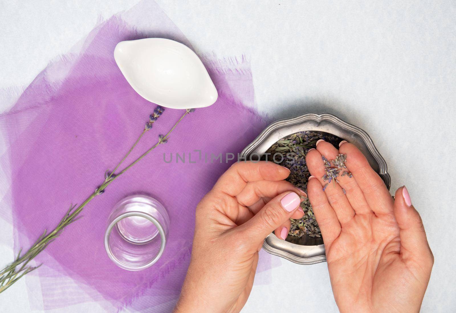 handmade lavender sachet DIY, step by step instructions, step one, Female hands in the frame